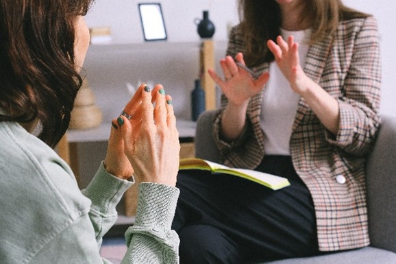 Focal Point - Image Of Two People Engaging In A Coaching Session